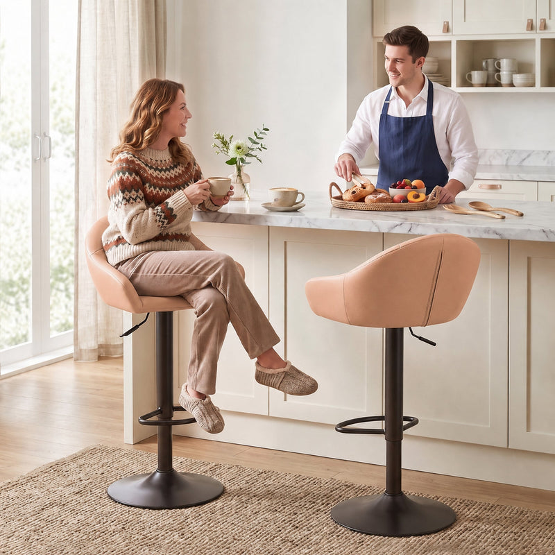 Blush pink bar stools at a kitchen island with a couple having coffee