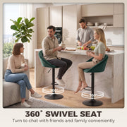 Family gathered at a kitchen island on dark green bar stools marked with 360 degree swivel arrows