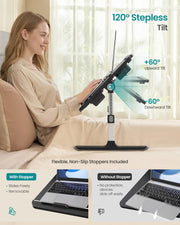 Woman typing in bed with the desk tilted, showing 60 degrees up and down and the non-slip stoppers