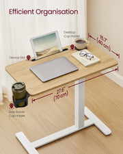 Device slot and cup holder layout labelled on the 70 x 40 cm top