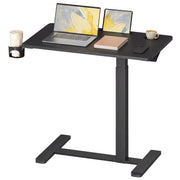 Studio shot of the 80 x 45 cm overbed table with laptop, tablet and side cup holder in use