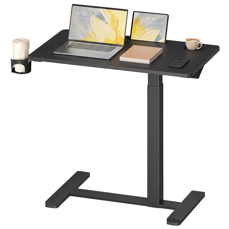 Studio shot of the 80 x 45 cm overbed table with laptop, tablet and side cup holder in use