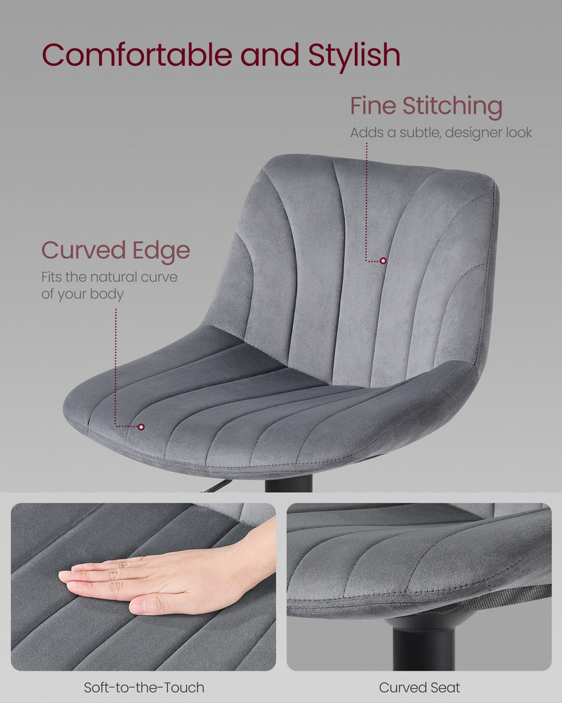 Close-up of the bar stool's curved seat and fine-stitched backrest detailing with a hand resting on the cushion