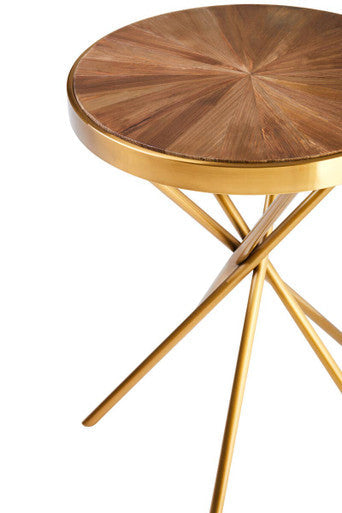 Close-up of the gold stainless steel rods gathered together to form the openwork pedestal