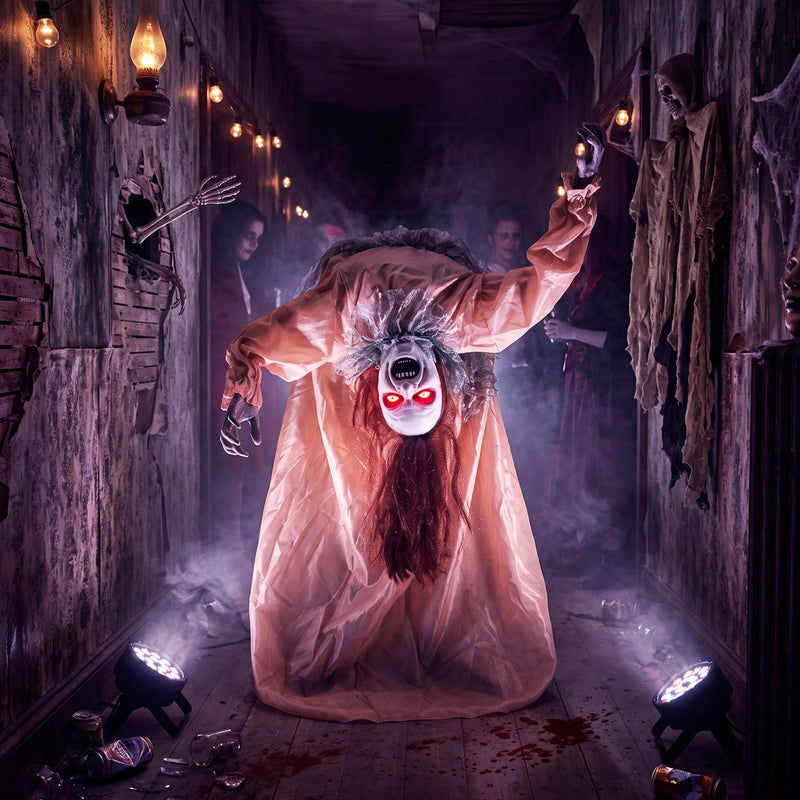 Broken-back ghost decoration displayed in a haunted house corridor with onlookers