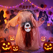 Broken-back ghost decoration displayed at an indoor Halloween party