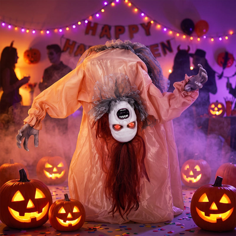 Broken-back ghost decoration displayed at an indoor Halloween party