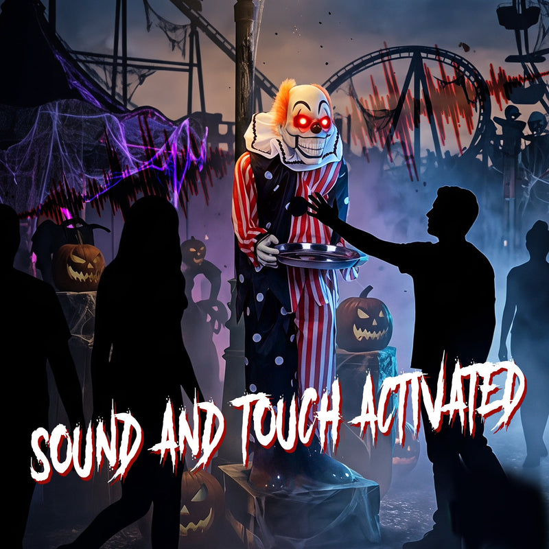 Animated candy tray clown decoration at a haunted carnival display with sound and touch activation