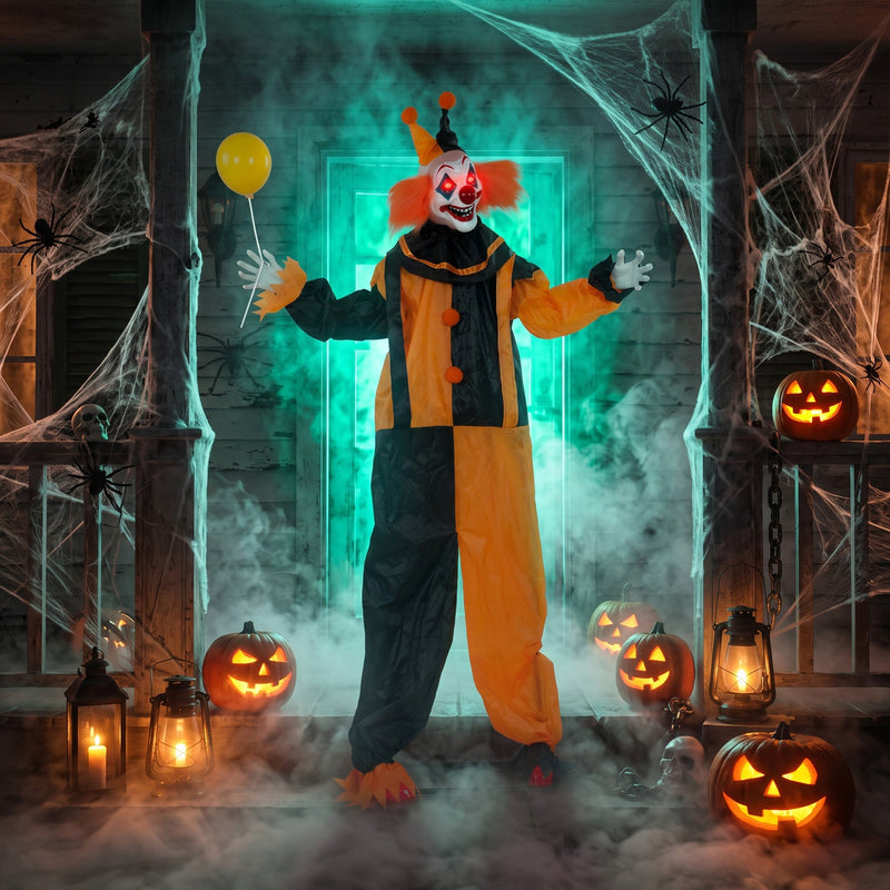Balloon prop clown decoration lit up on a haunted porch display at night