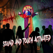 Animated clown decoration at a Halloween fright night display with sound and touch activation