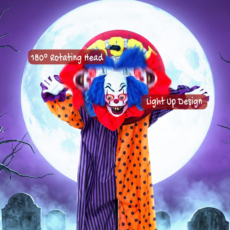 Clown decoration labelled with 180 degree rotating head and light-up design in front of a full moon