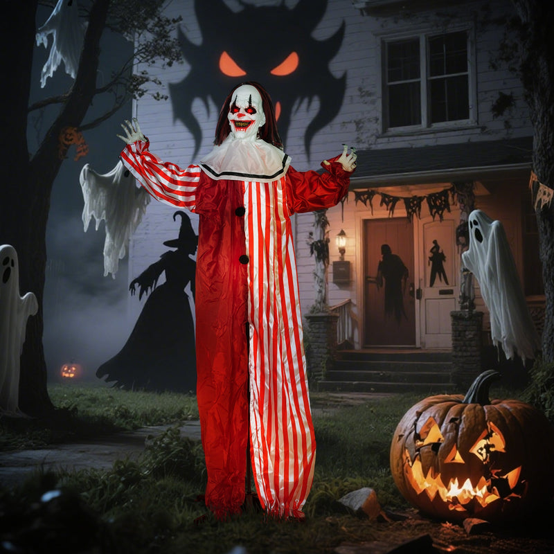 Outsunny animated Halloween clown decoration displayed outside a haunted house at night with ghost decorations