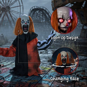 Joker clown decoration labelled with light-up design and changing face feature at a fairground