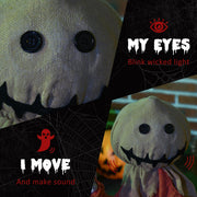 Close-up of the figure's burlap sack head with black button eyes and a stitched grin