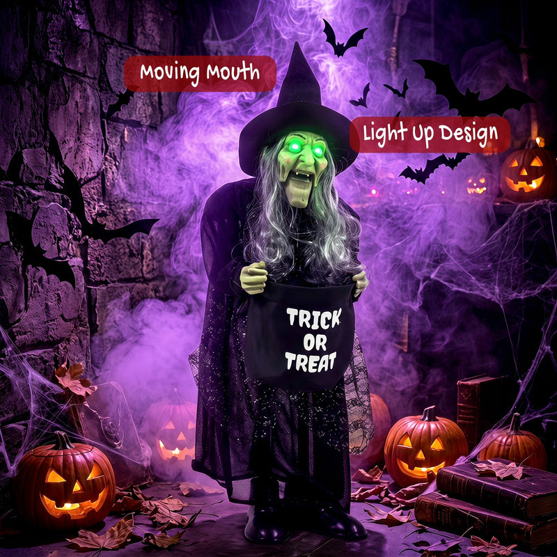 Animated witch decoration among pumpkins and books with moving mouth and light up callouts