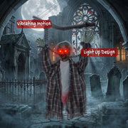 Hanging zombie decoration labelled with vibrating motion and light-up design in a graveyard