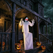 Hanging swing ghost decoration displayed on a haunted porch among jack-o-lanterns