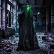 Pop-up ghost decoration revealed with a glowing green face inside a derelict building