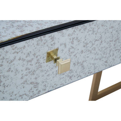 Detail of the mirrored drawer front and bevelled panel edge