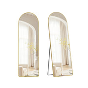 Arched full length floor mirror on its stand, shown face-on and from the side, reflecting a cream armchair and curtains