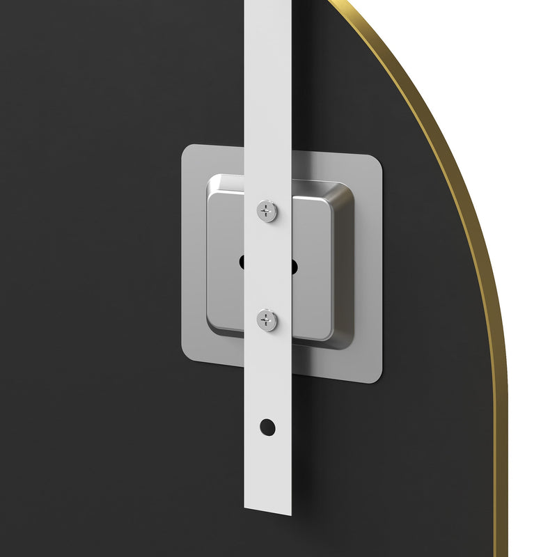 Close-up of a hook and mounting plate on the back of the arched mirror