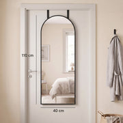 Arched mirror on a door with 110 cm height and 40 cm width marked