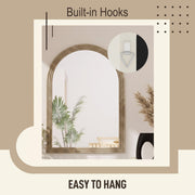 Close-up of the built-in wall mounting hooks on the back of the brown mirror