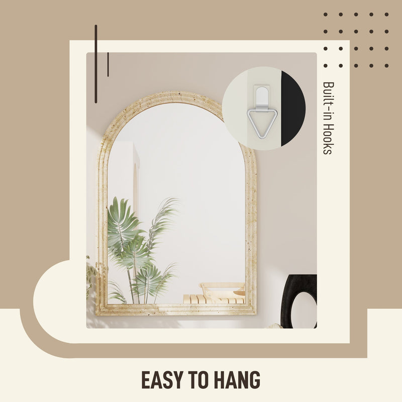 Close-up of the built-in wall mounting hooks on the back of the beige mirror