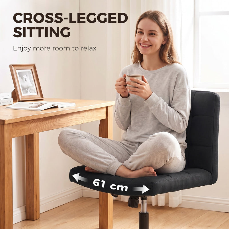 Woman sitting cross-legged on the wide 61cm seat with a mug of coffee