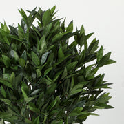 Close-up of the glossy artificial bay laurel leaves on the topiary ball