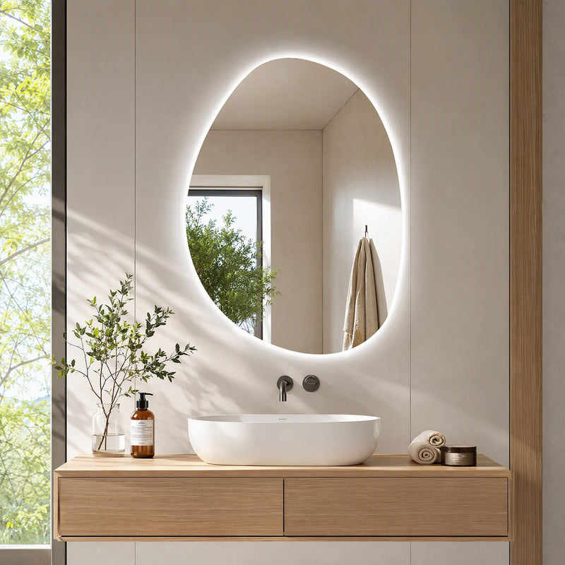 Asymmetric LED bathroom mirror, 80 x 60 cm: illuminated above a wooden vanity and white basin