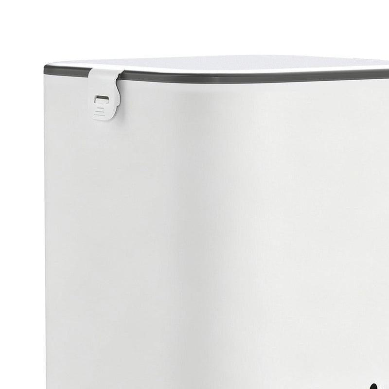 Close-up of the feeder's white hopper with grey lid and latch