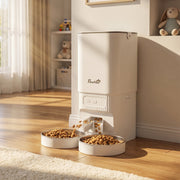 Cat feeder with both bowls filled with kibble in a sunlit living room