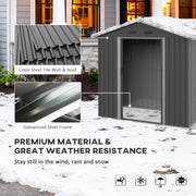 Image of a small grey metal outdoor garden storage shed with apex roof