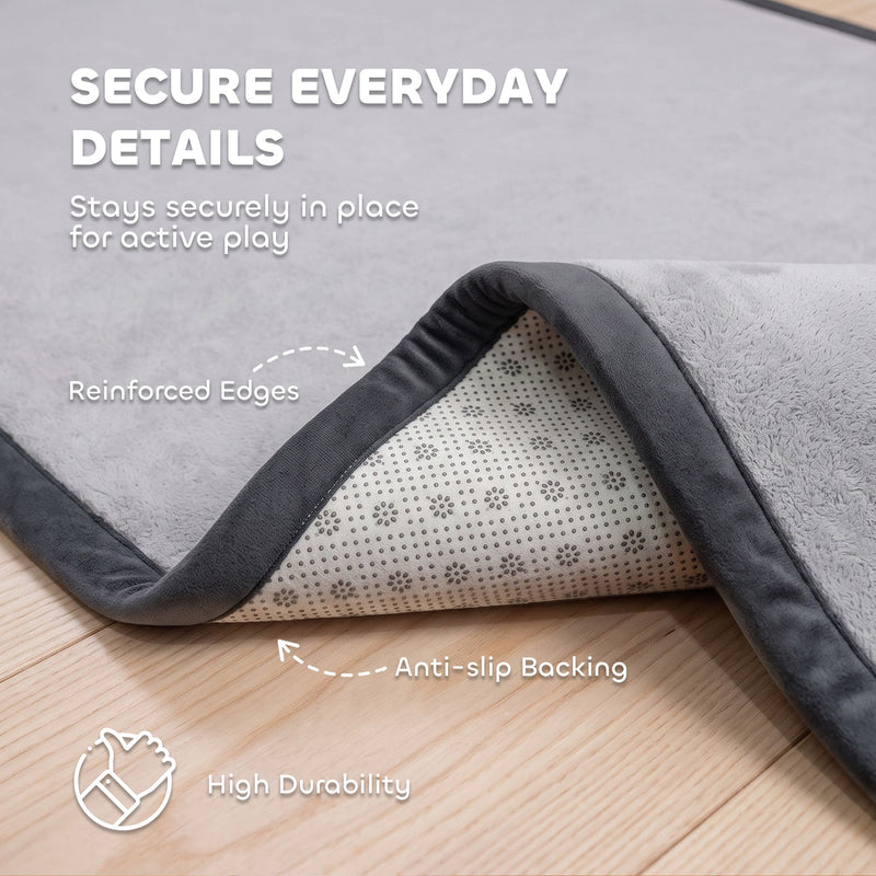 Underside of the play mat showing the dotted anti-slip backing and reinforced edges