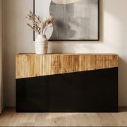 Natural bamboo and ebony black console table styled in a hallway beneath a mirror