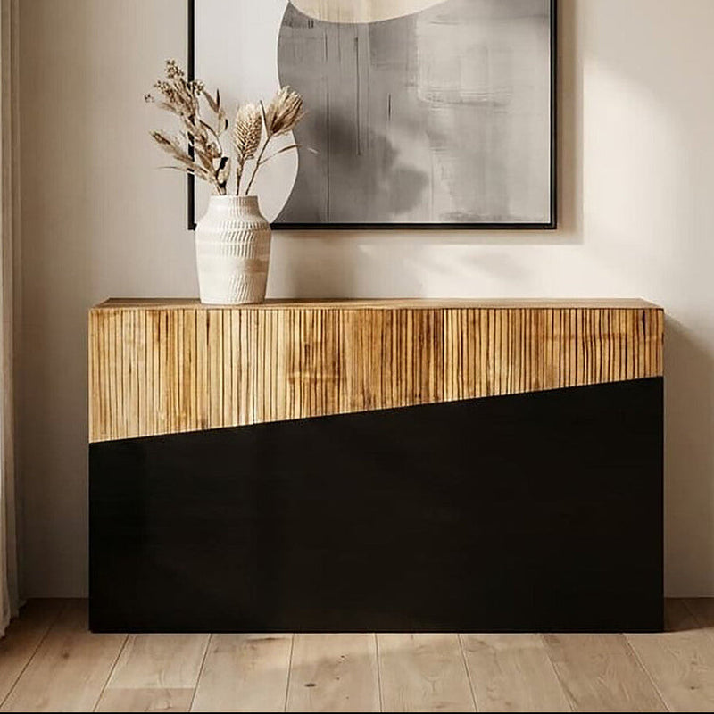 Natural bamboo and ebony black console table styled in a hallway beneath a mirror