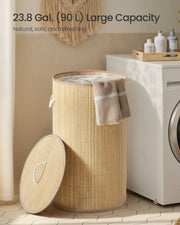 Bamboo laundry basket shown beside a washing machine highlighting its 90 litre capacity