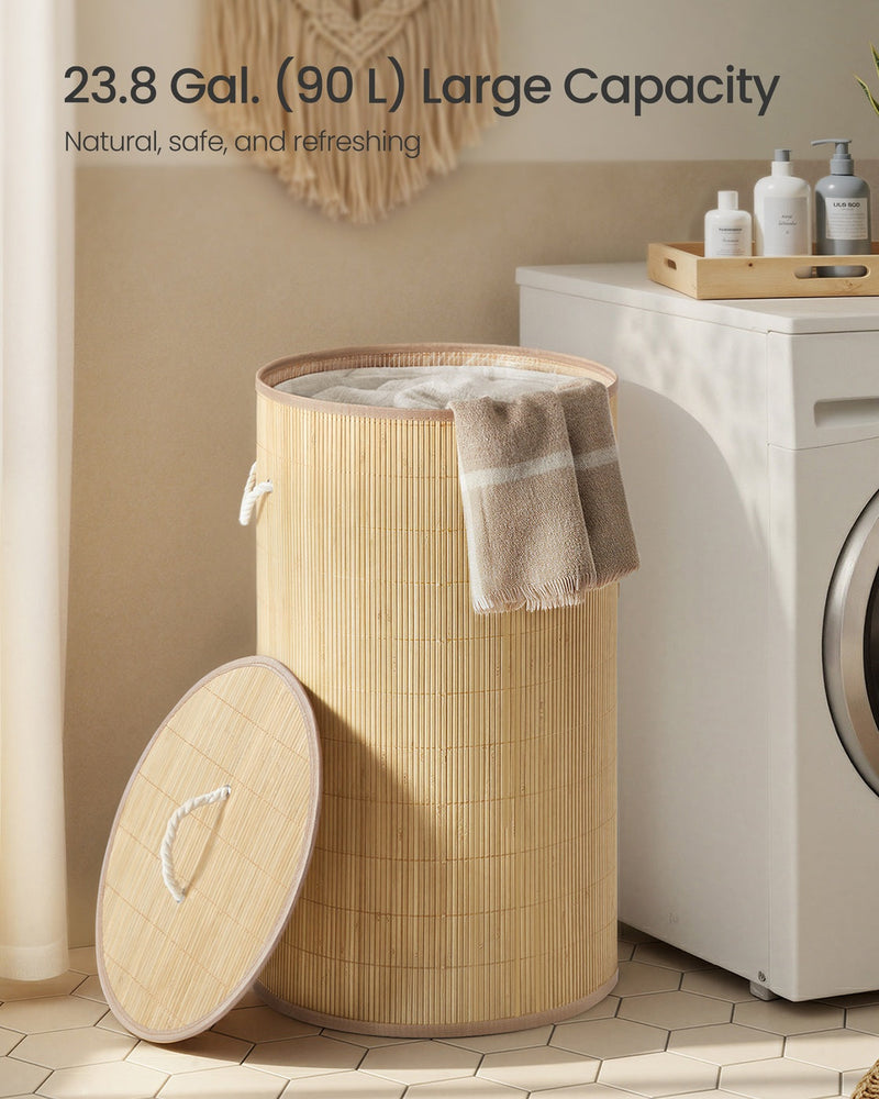 Bamboo laundry basket shown beside a washing machine highlighting its 90 litre capacity