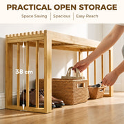 Open lower area of the bamboo bench measuring 38 cm high with baskets and shoes stored