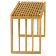 Side view of the slatted bamboo bench top and leg frame on a white background