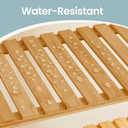 Water droplets beading on the bamboo slats showing the water-resistant finish