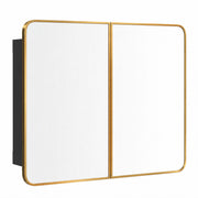 Gold tone double door mirror cabinet on a plain white background