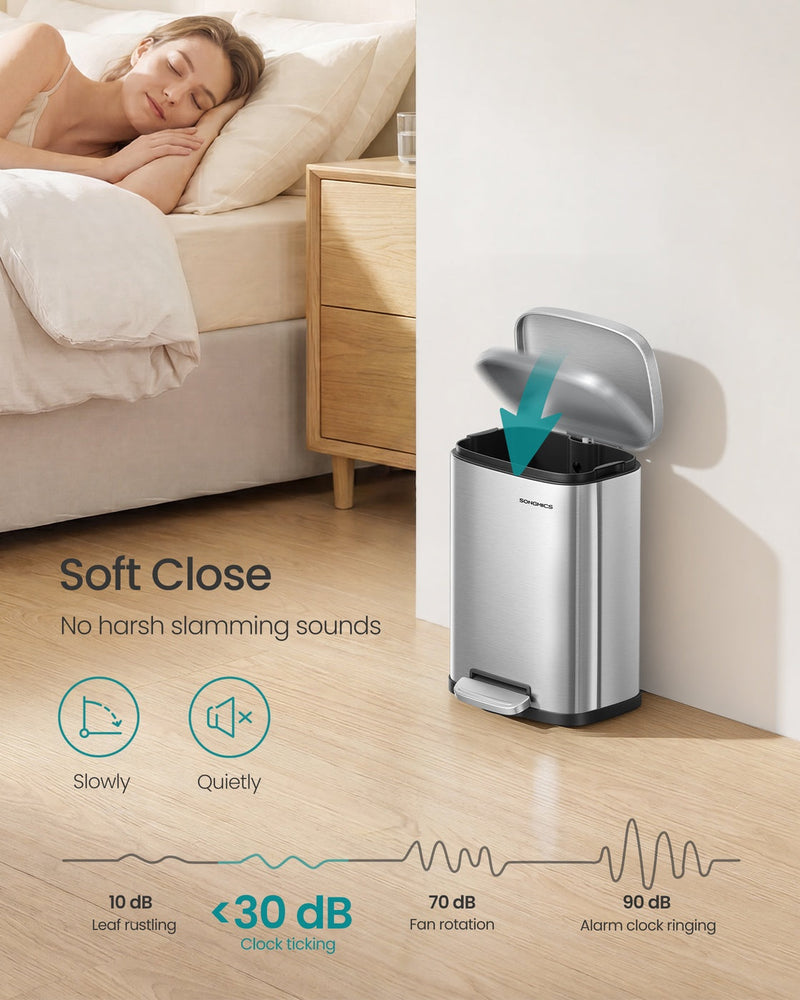 Pedal bin beside a bed with an arrow showing the soft-close lid lowering, above a noise scale marking under 30 dB