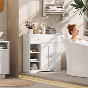 White bathroom cabinet beside a freestanding bath holding rolled towels and toiletries