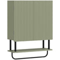 Green bathroom wall cabinet with fluted double doors, open shelf and black towel rail on a plain background
