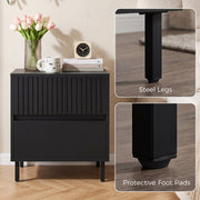 Detail of black bedside cabinet's steel legs and protective foot pads