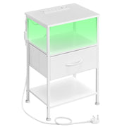 Plain studio view of the Cloud White bedside table showing the lit shelf, single fabric drawer and lower open shelf