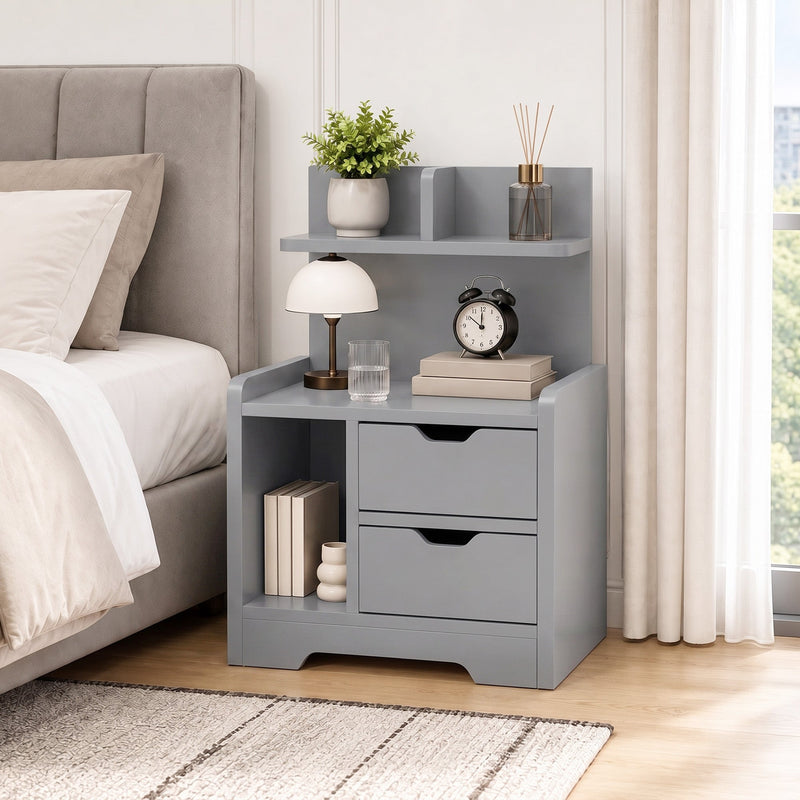 HOMCOM grey bedside table styled next to a bed with a lamp, clock and books on top