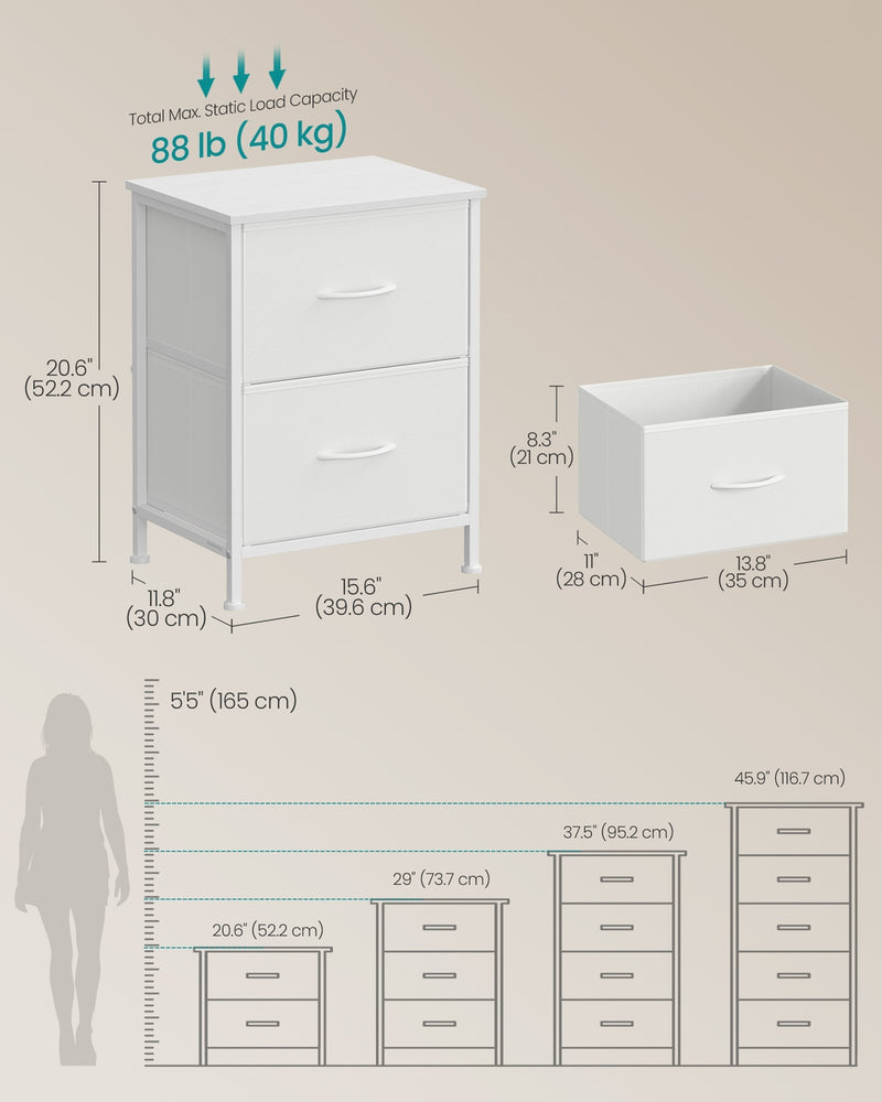 Bedside table styled next to a bed with a lamp on top